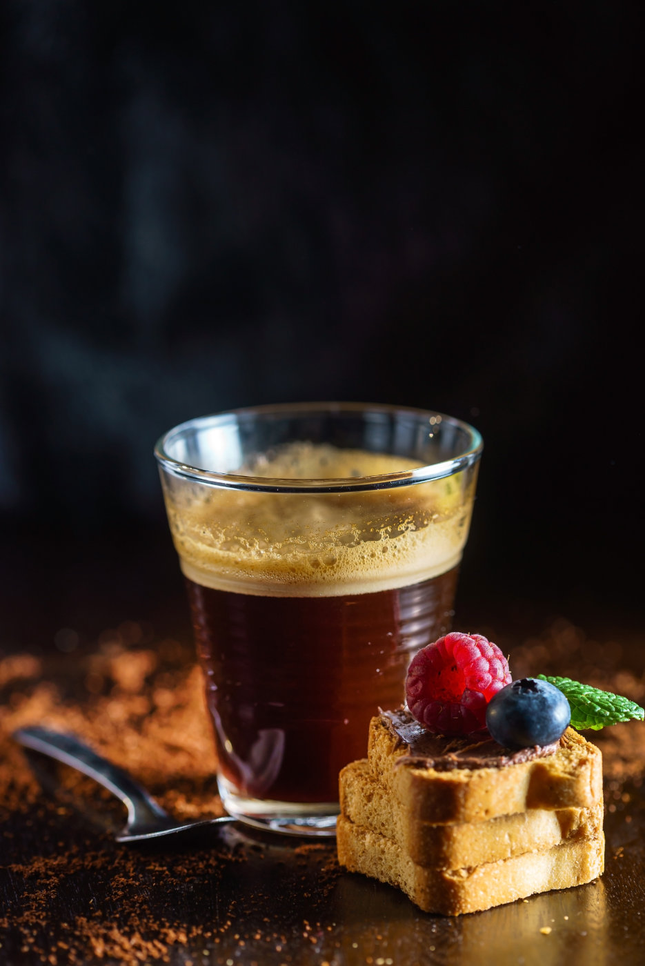 Espresso served with a slice of cake